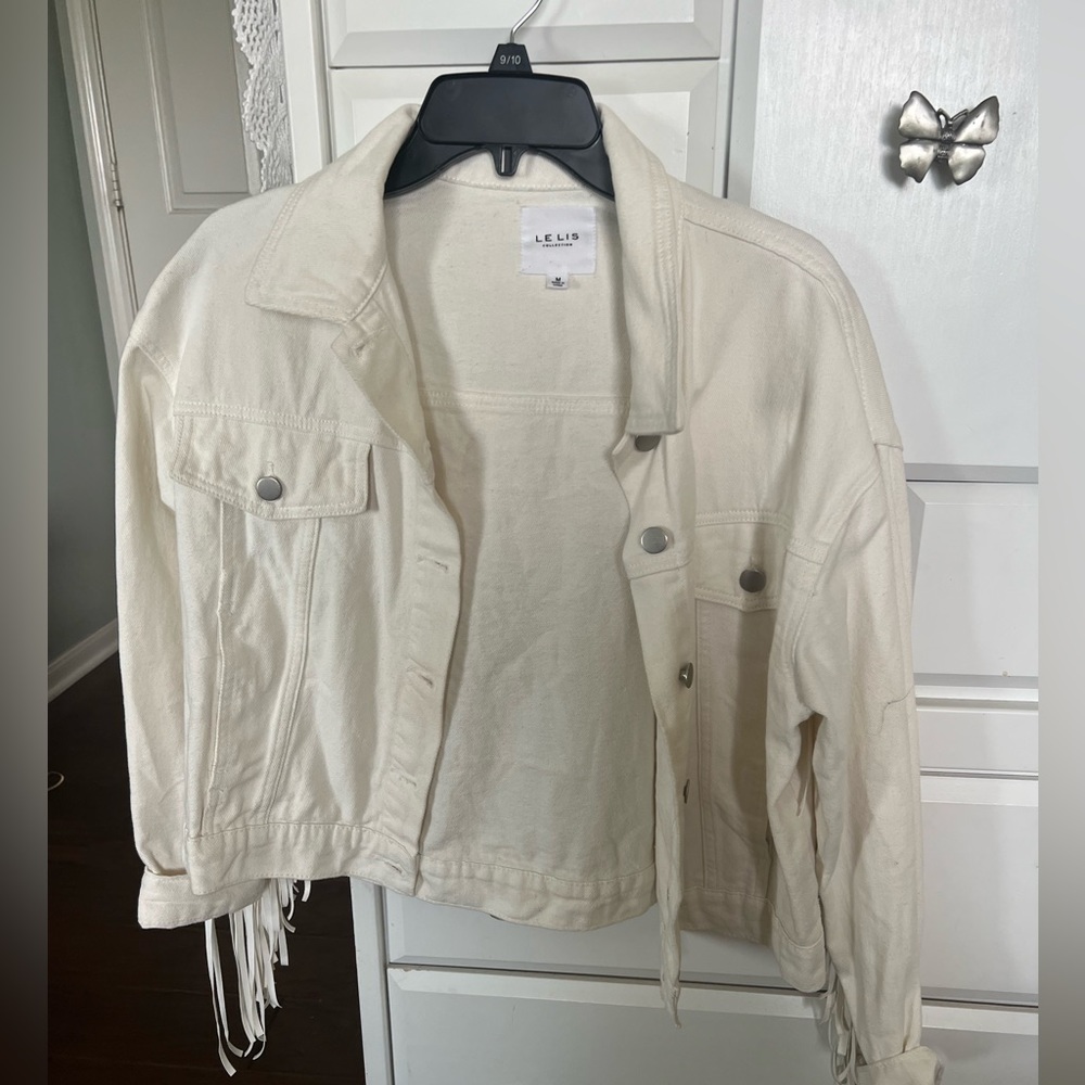 Cropped white fringe jean jacket